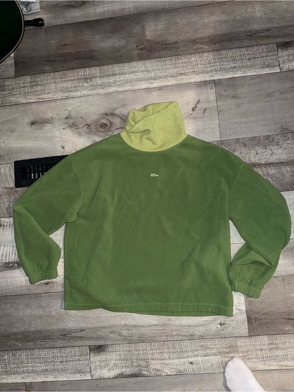 Woman’s Green Two-Tone Turtleneck Sweater